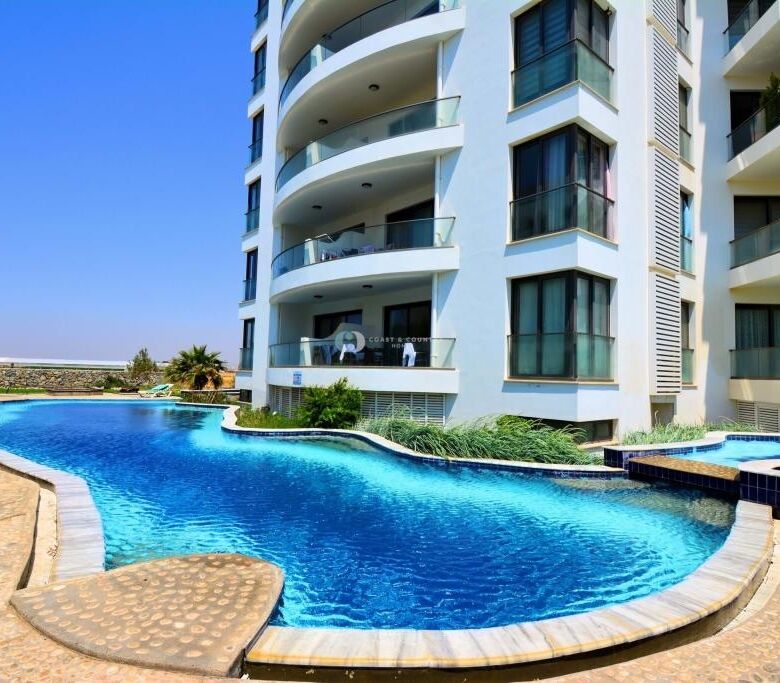 Apartment complex with outdoor pool and spacious balconies at Aphrodite Beach Resort, Guzulyurt, Nor.