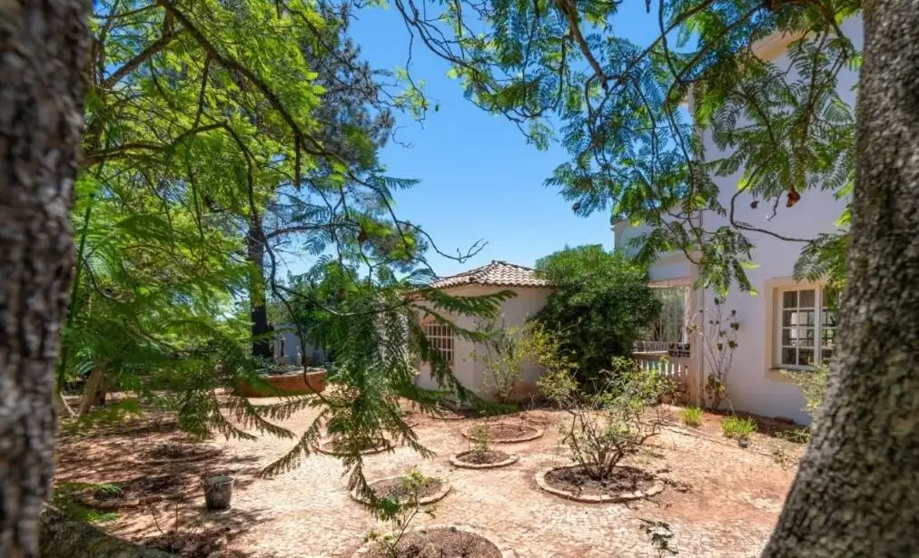 Luxury 5 Bed Country Estate & Annexe Elegant country estate with lush garden and mature trees in Algoz Algarve.