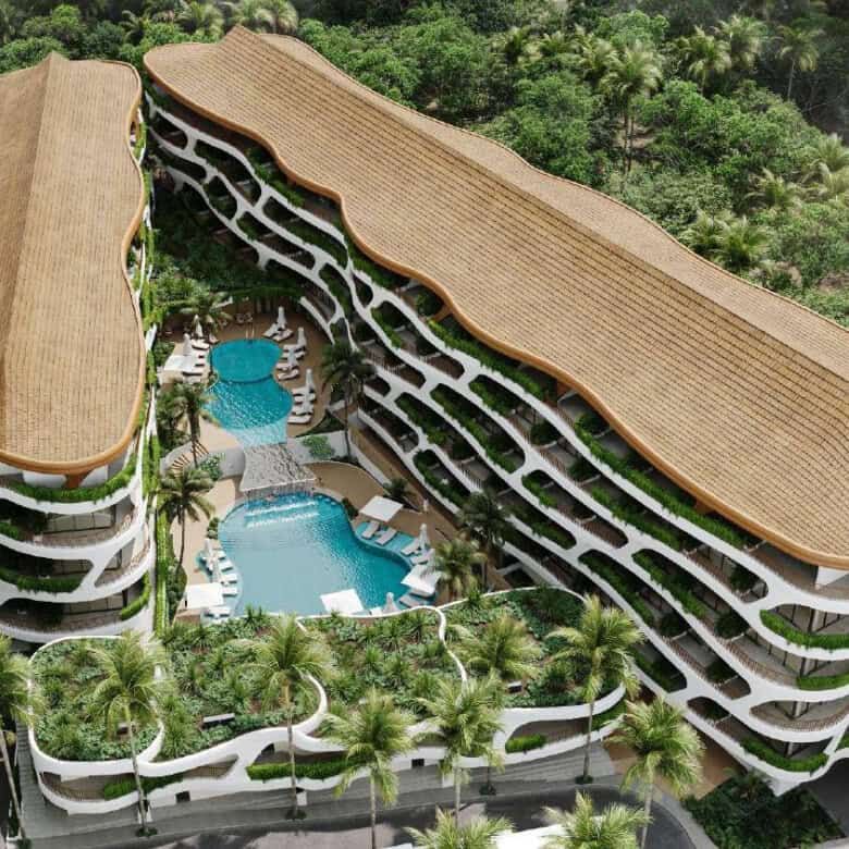 Stylish Bali apartment for sale with pool, surrounded by tropical gardens in Pandawa Dream Complex.