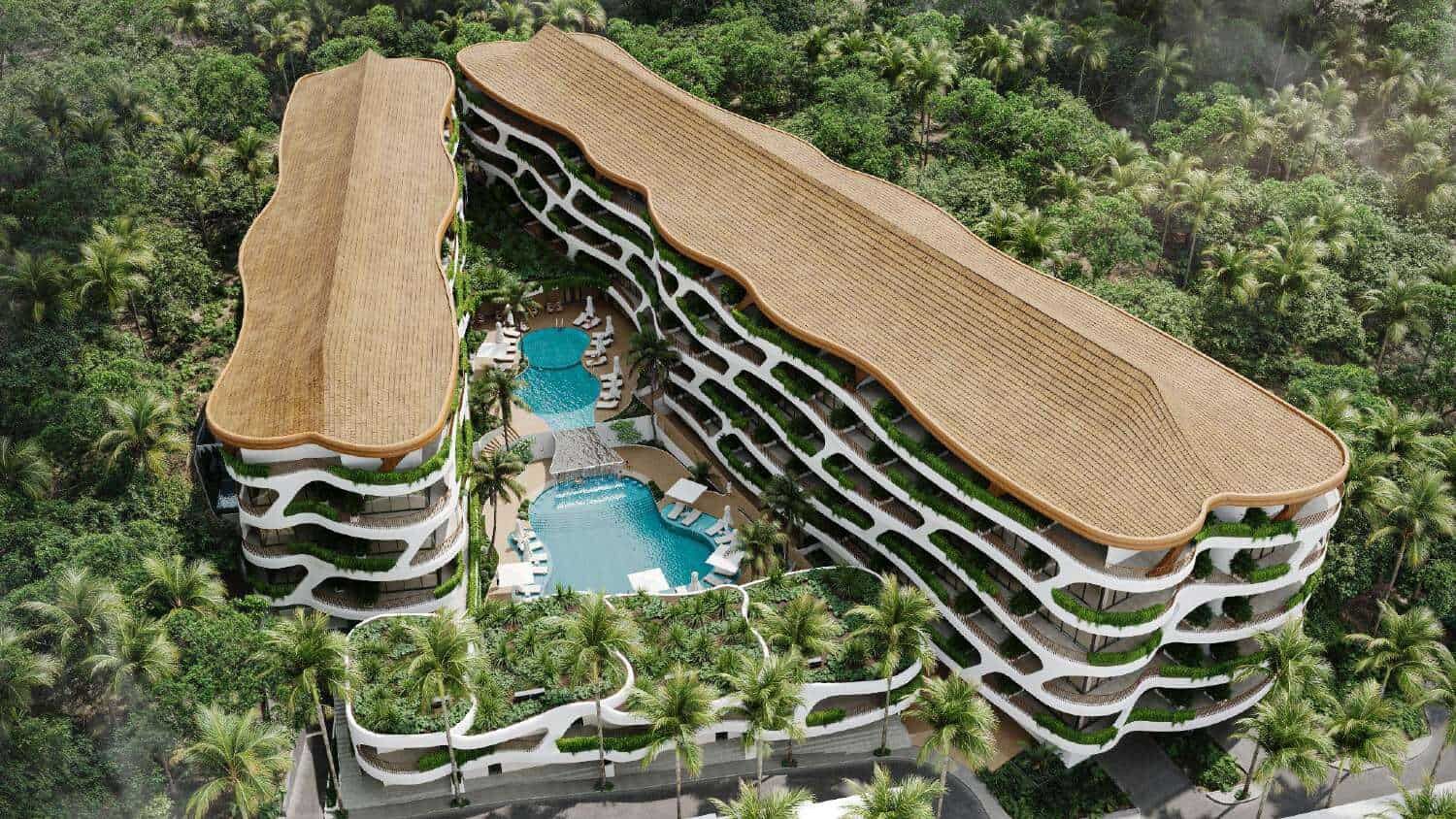 Modern Bali apartment complex with pool and lush greenery Stylish Bali apartment for sale with pool, surrounded by tropical gardens in Pandawa Dream Complex.