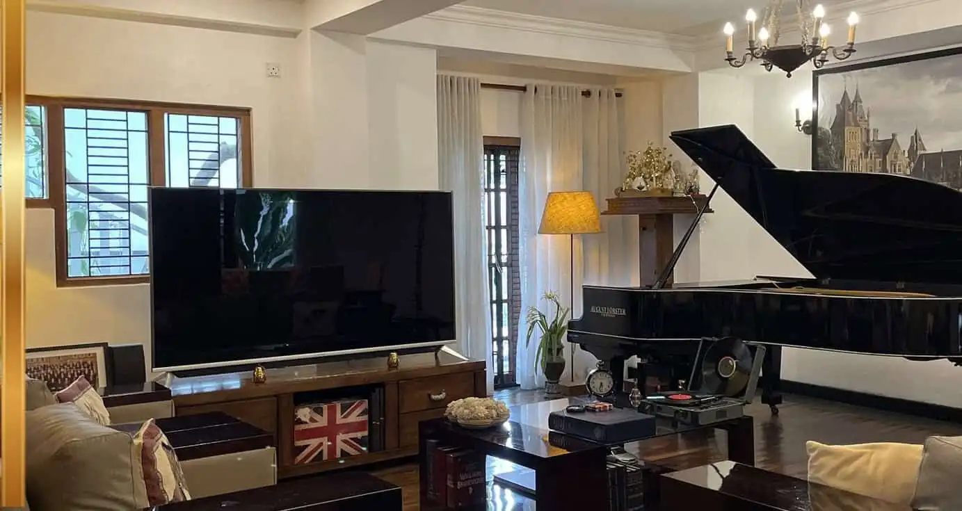 Elegant living room with grand piano and modern decor in Colombo, Sri Lanka.