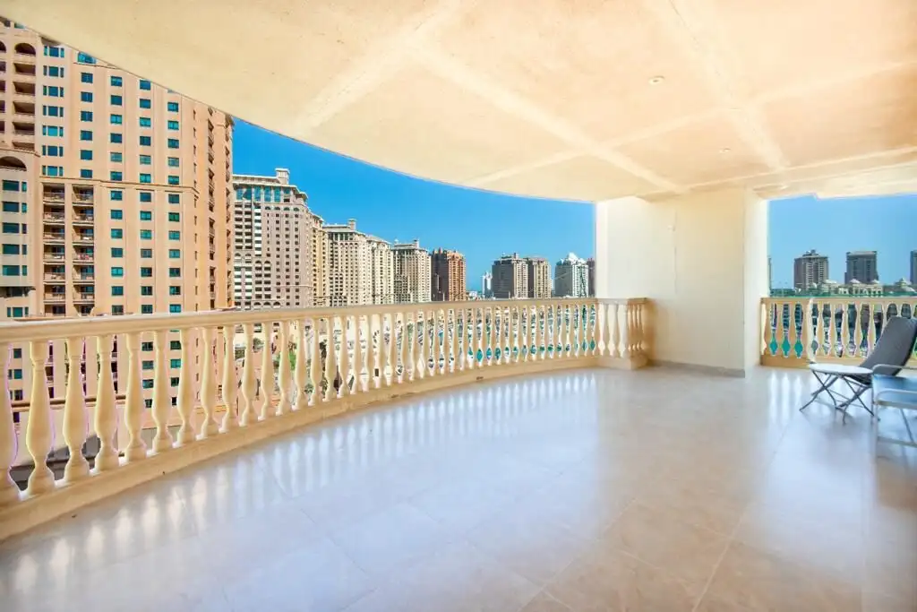Large balcony overlooking city skyline and marina in The Pearl. Perfect for relaxing and enjoying se.