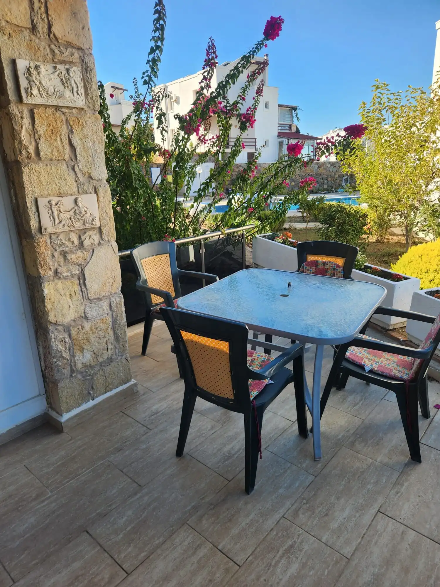 Luxury 3 Bed Villa in Gumusluk with Sea View Sea view terrace with outdoor dining area in Gumusluk, Turkey. Perfect for relaxing and enjoying the.