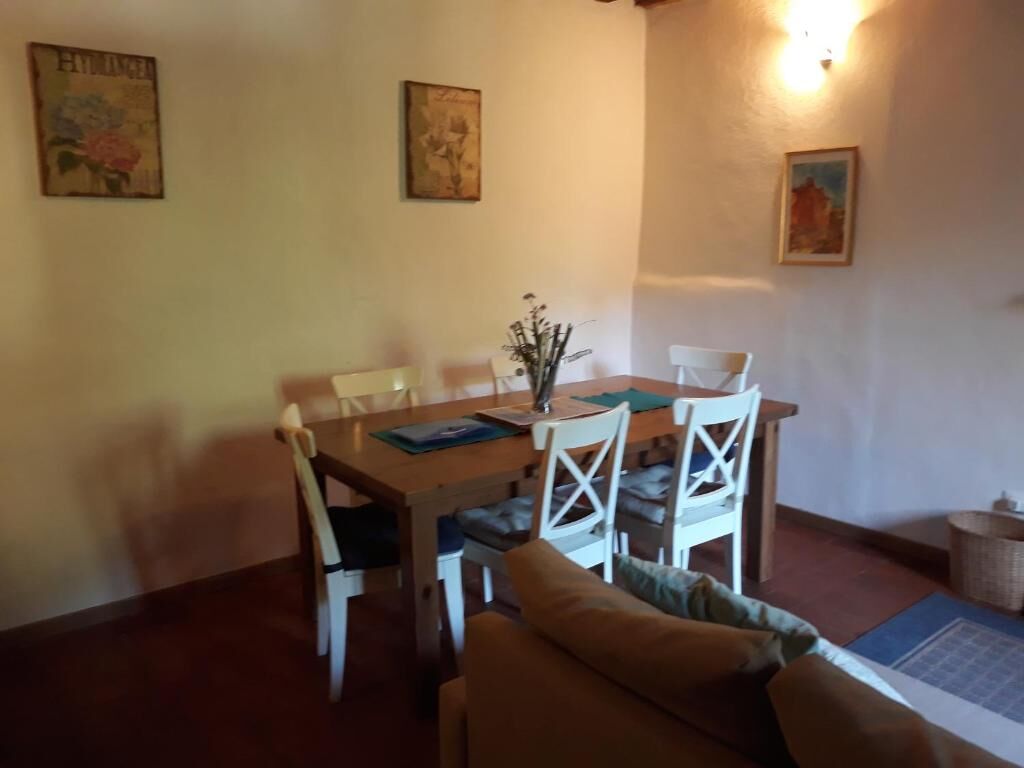Elegant dining area in a spacious Bagni di Lucca villa with classic decor.
