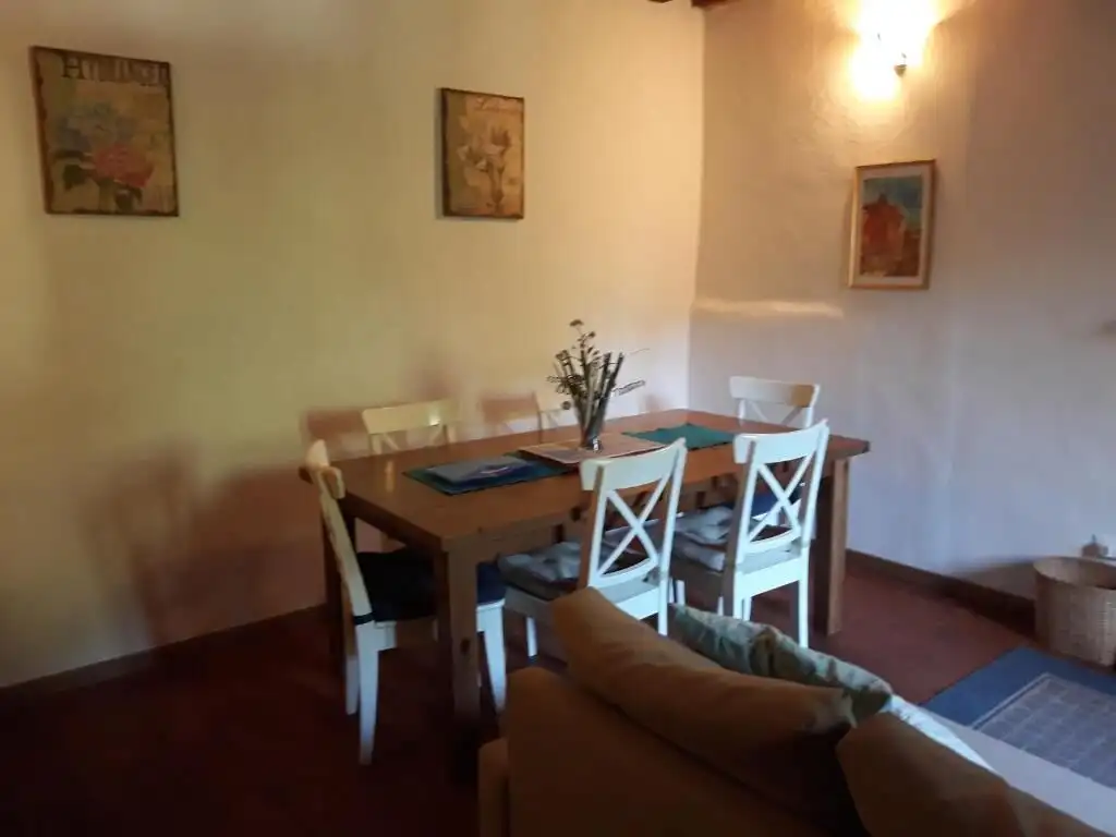Elegant dining area in a spacious Bagni di Lucca villa with classic decor.