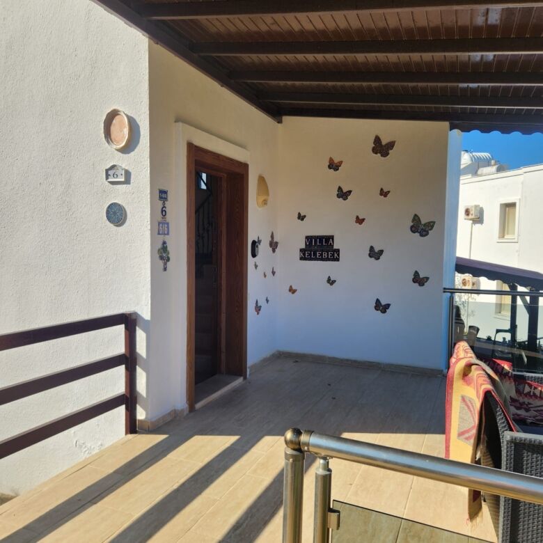 Spacious balcony of a luxury 3-bedroom villa with sea view in Gumusluk.