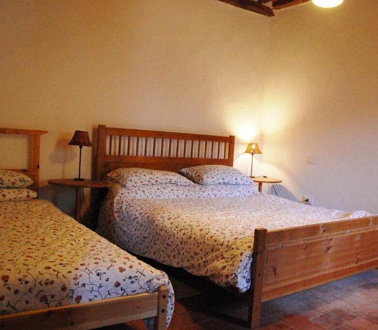 Spacious bedroom in a luxury 8-bedroom house in Bagni di Lucca, Italy. Perfect for comfortable livin.