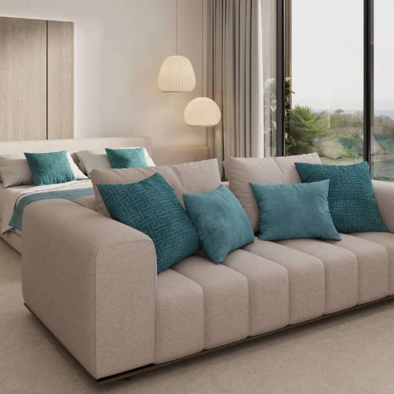 Spacious living area in Bali's Pandawa Dream Complex featuring a comfortable sofa and scenic ocean v.
