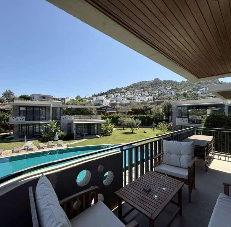 Modern 2-bedroom apartment with pool in Yalıkavak Bodrum, perfect for luxury living and investment.