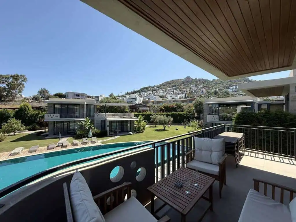 Modern 2-bedroom apartment with pool in Yalıkavak Bodrum, perfect for luxury living and investment.