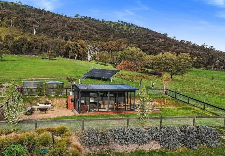 Equestrian estate with 6 bedrooms in Flowerdale Vic, featuring lush pastures and modern amenities.