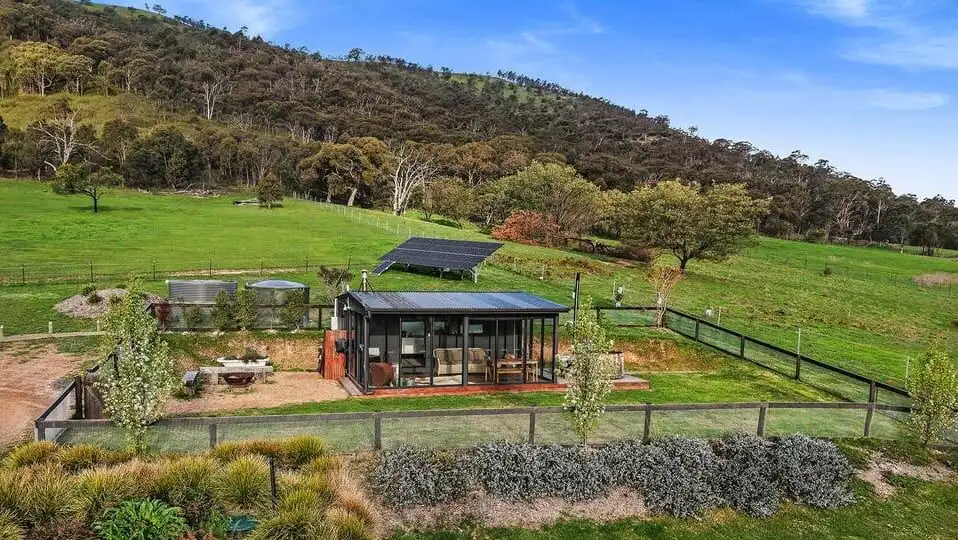 Equestrian estate with 6 bedrooms in Flowerdale Vic, featuring lush pastures and modern amenities.
