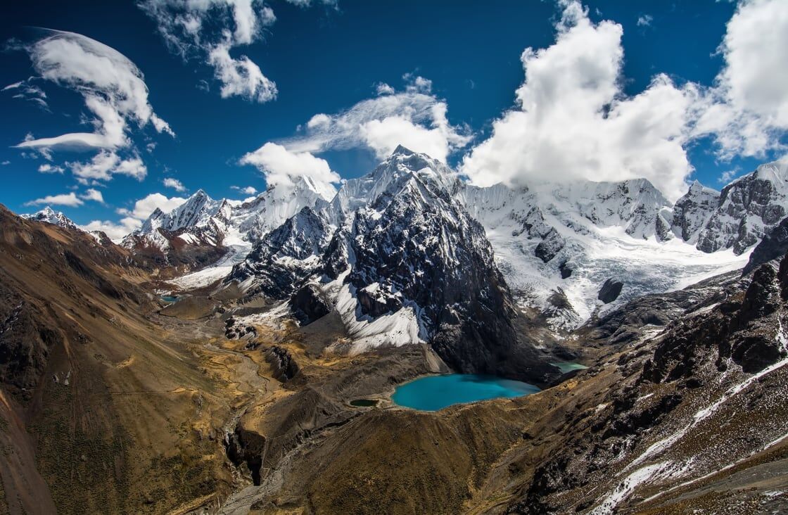 Excellent Plot of land for sale in The Peruvian Switzerland Scenic view of Peruvian Switzerland with mountains, snow, and a turquoise lake.