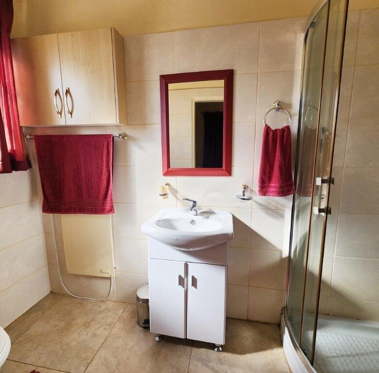 Spacious bathroom with modern fixtures in Albertville Johannesburg South.