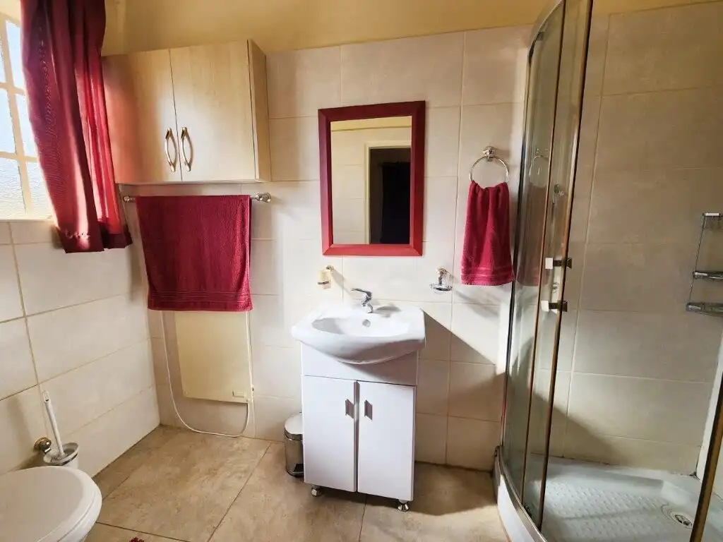 Spacious bathroom with modern fixtures in Albertville Johannesburg South.