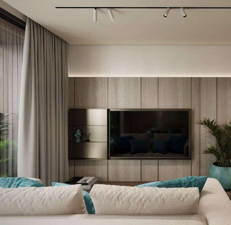 Modern Bali apartment living room with TV and stylish decor.