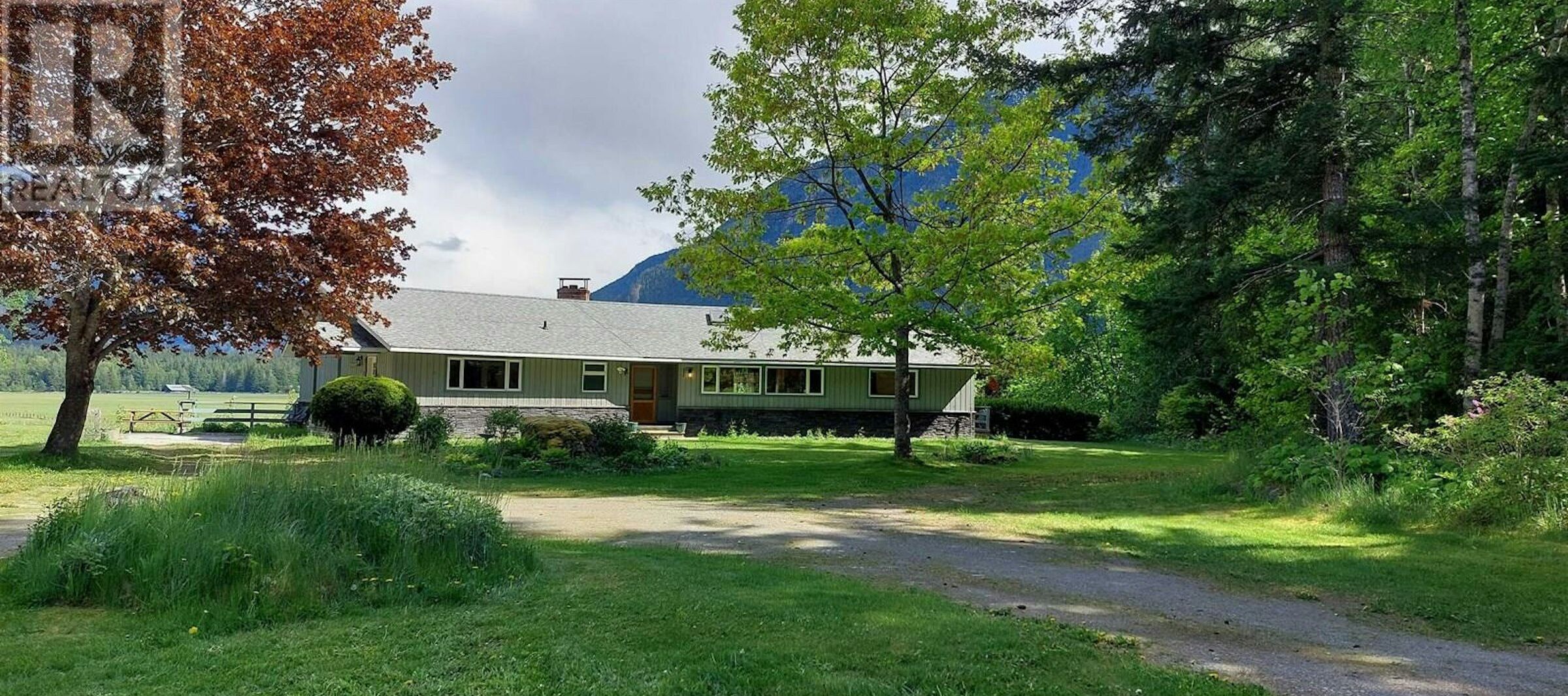 Excellent 4 Bed Estate in Bella Coola BC Beautiful 4-bedroom estate in Bella Coola, British Columbia, surrounded by lush greenery and mountai.