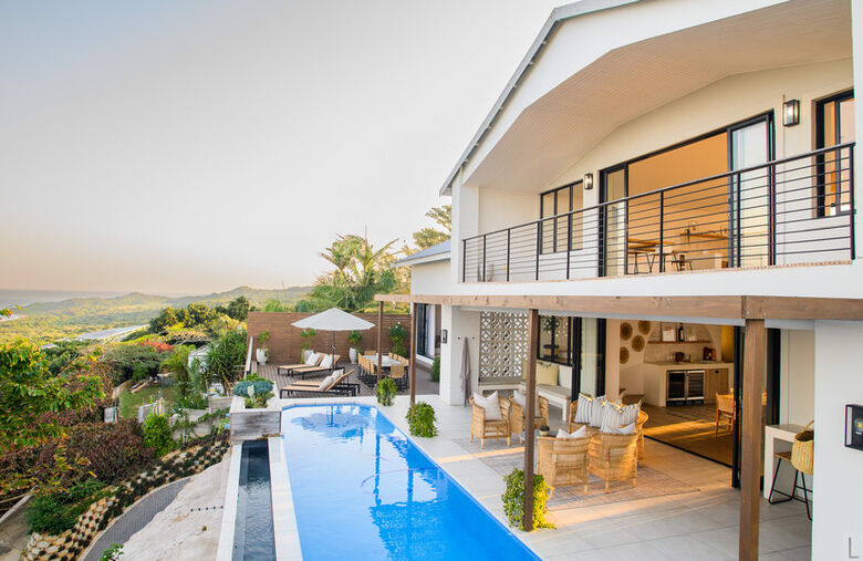 Modern luxury 4-bedroom villa with pool in Zinkwazi Beach, South Africa.