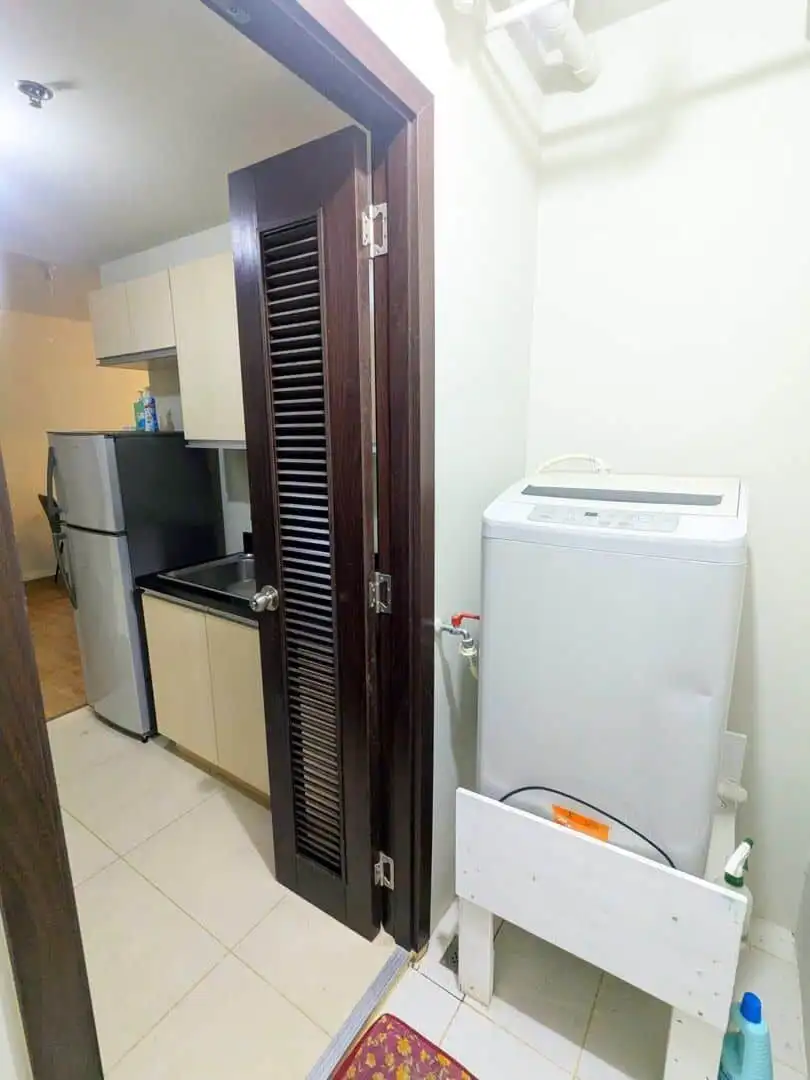 Bright interior of a 1-bed apartment in Kroma Tower Manila.