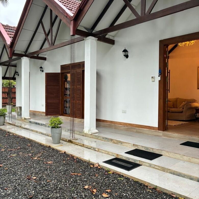 Estate with 2 houses for sale in Waikkal, Sri Lanka, featuring a contemporary design and spacious ou.