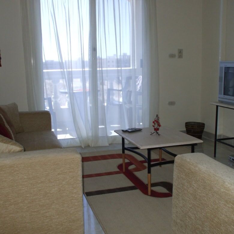 Modern 1-bedroom apartment in Oasis 5 complex, Hurghada, with bright living space and sea views.