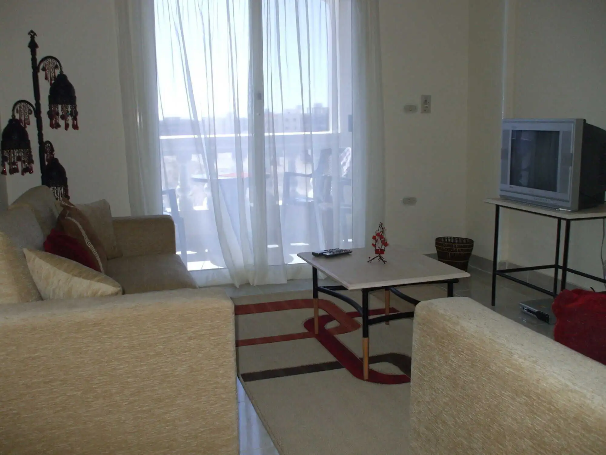 Modern 1-bedroom apartment in Oasis 5 complex, Hurghada, with bright living space and sea views.