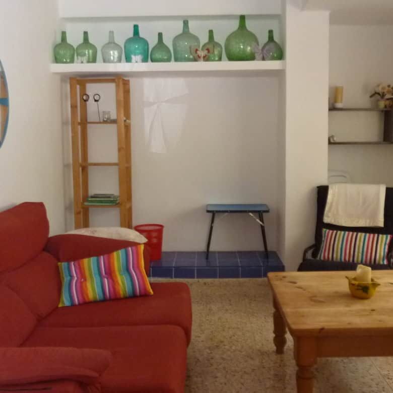 Bright living room with colorful decor in a Valencia villa for sale.