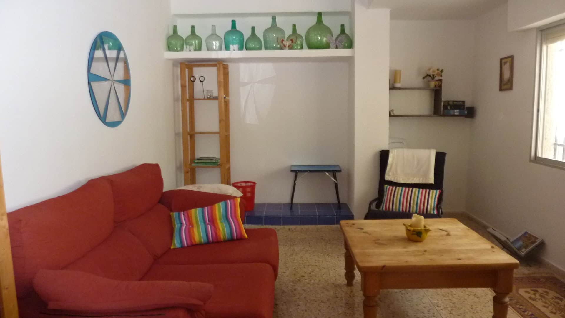 Modern living room in a villa in Valencia Bright living room with colorful decor in a Valencia villa for sale.