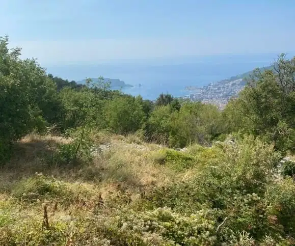 Beautiful land plot in Budva Montenegro offering panoramic views of the Adriatic Sea and surrounding.