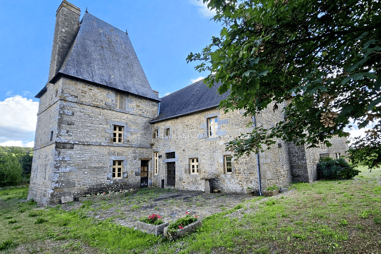 Luxury 5 Bed Le Manoir de Dougeru Charming stone manor house with five bedrooms in Normandy for sale. Historic property with spacious.