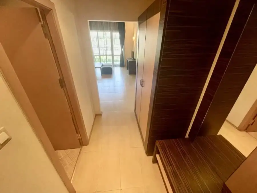 Modern ground floor apartment in Majestic, Sunny Beach, 64 sq.m. Bright interior with living area and balcony access.