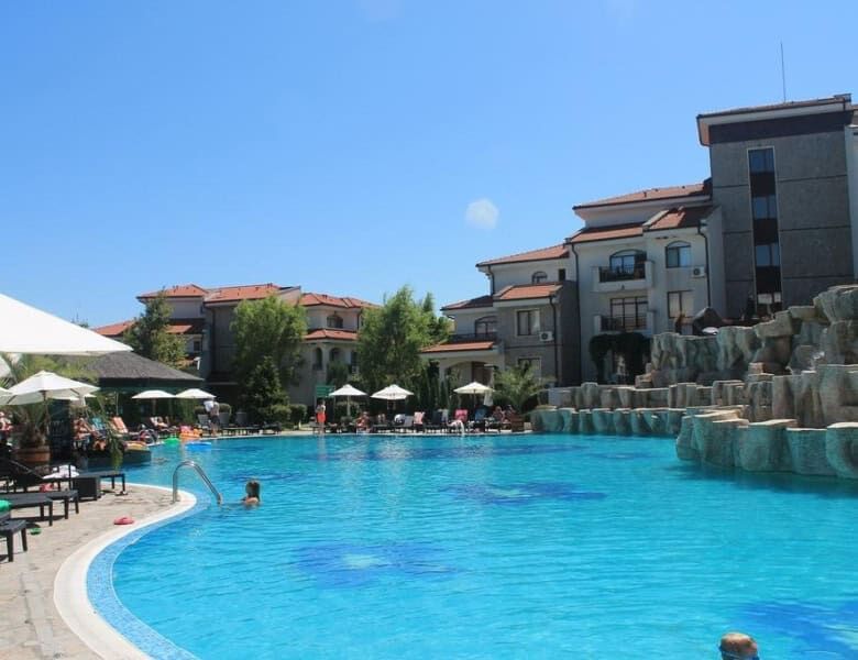 Relaxing pool area at Vineyards SPA Resort near the sea, perfect for leisure and vacation.