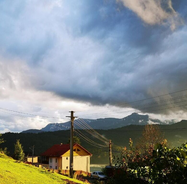 Two charming houses available for purchase in Bicaz, set against a scenic mountain backdrop. Ideal f.