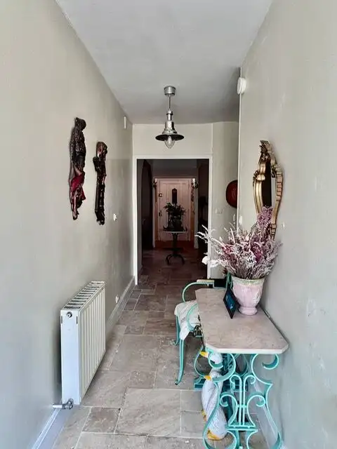 Balcony view of a modern 2-bedroom apartment in Santiago De La Ribera, Murcia, with outdoor seating.