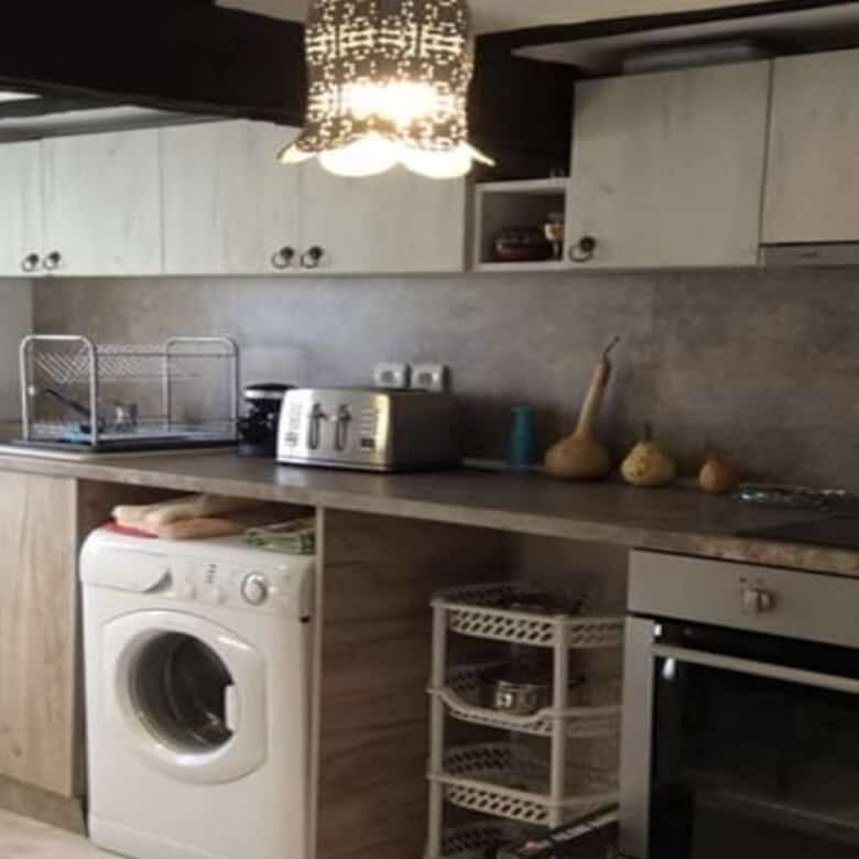 Cozy kitchen with modern appliances in Rogulyat Mlechevo villa for sale.