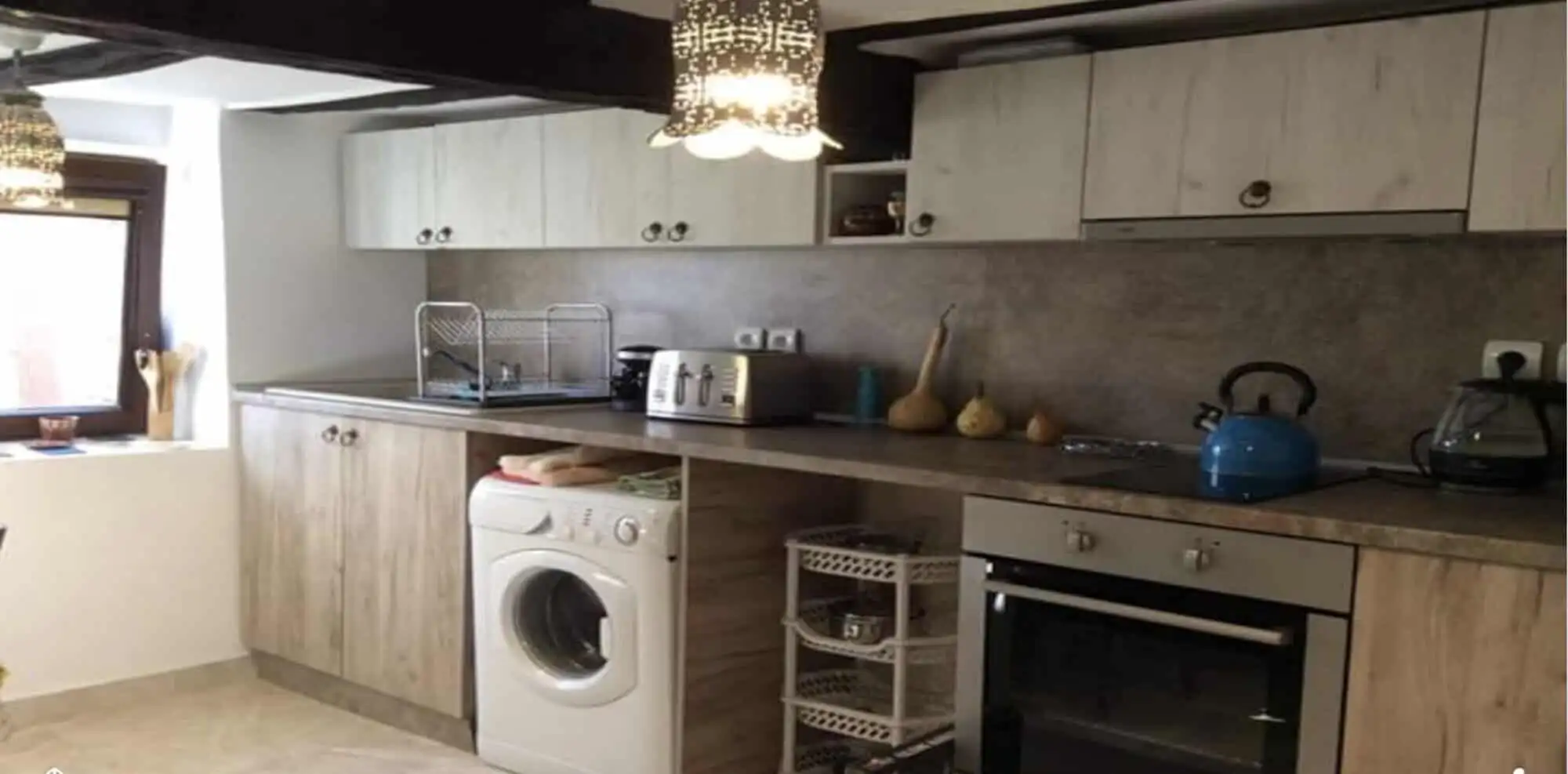 Cozy kitchen with modern appliances in Rogulyat Mlechevo villa for sale.