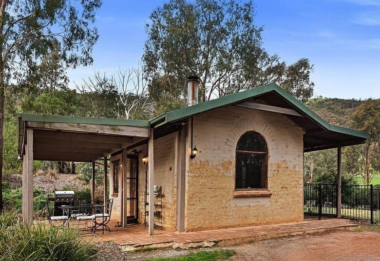 Elegant 6-bedroom equestrian property for sale in Flowerdale Victoria with spacious stables and scen.