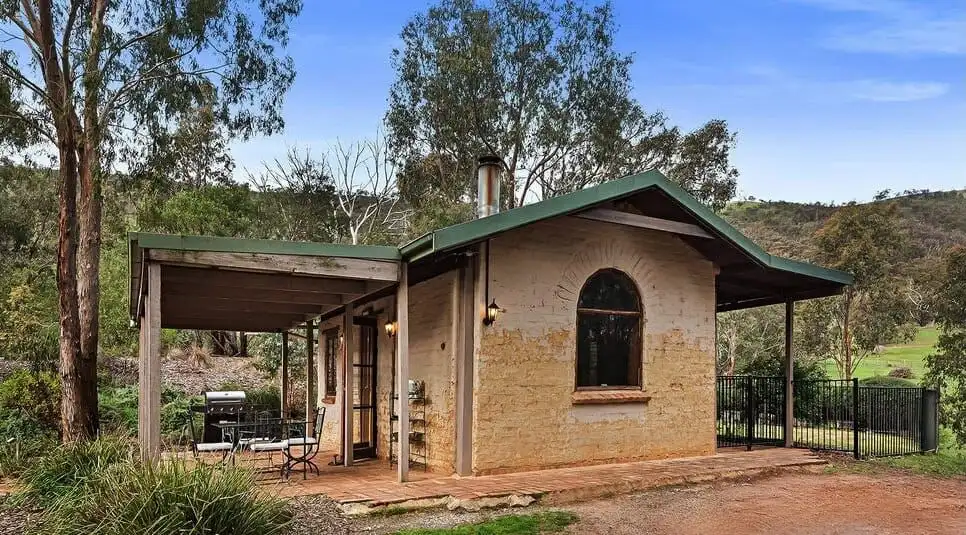 Elegant 6-bedroom equestrian property for sale in Flowerdale Victoria with spacious stables and scen.