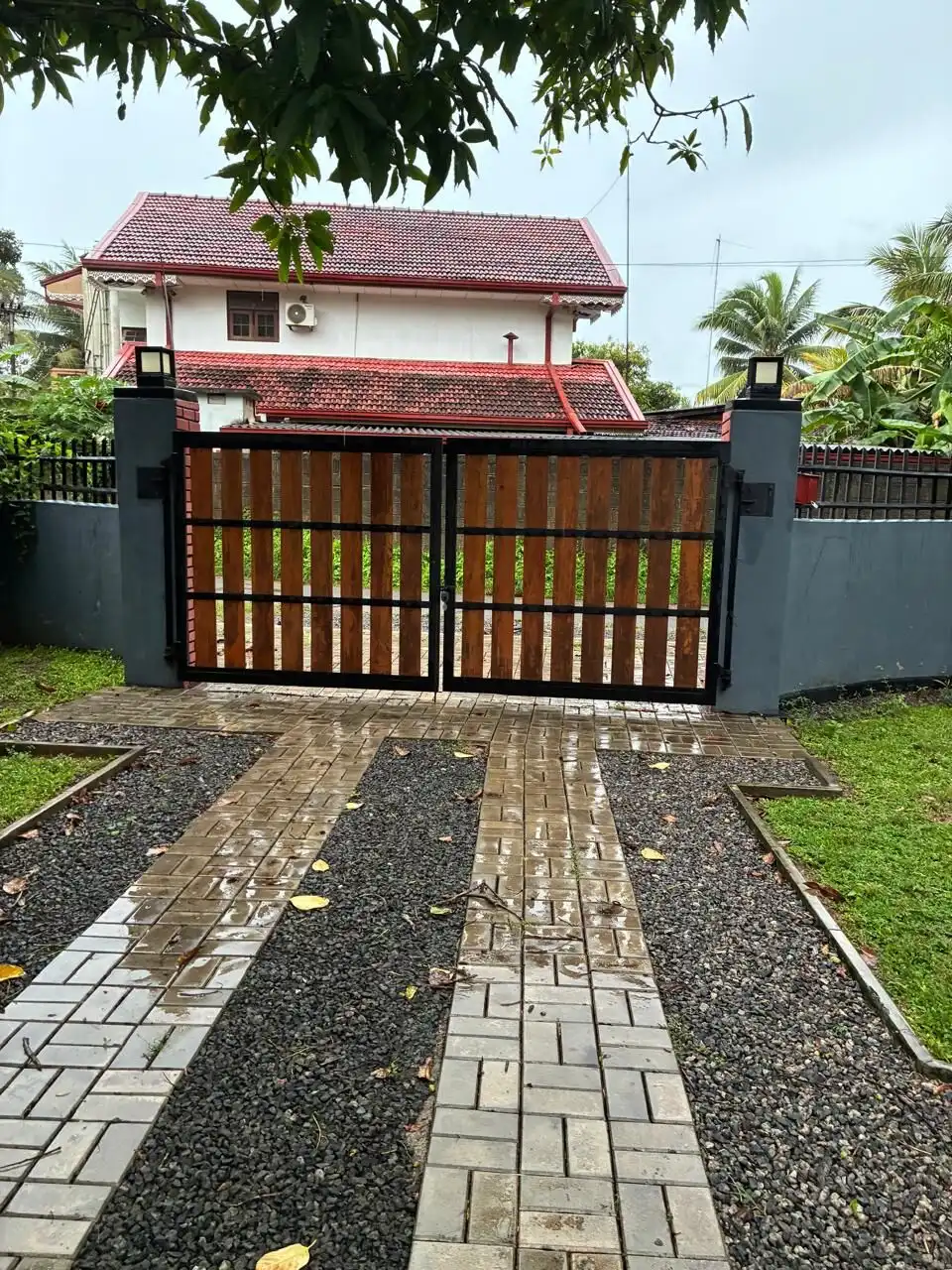 Charming estate featuring two houses available for sale in Waikkal, Sri Lanka, with lush surrounding.