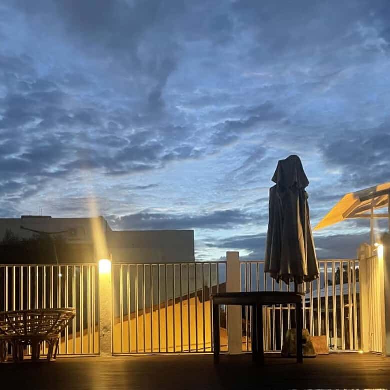 Modern Colombo house with outdoor terrace and scenic sky view.
