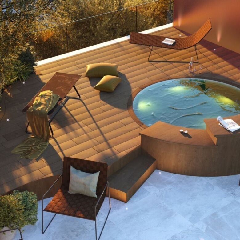 Outdoor terrace with hot tub, lounge chairs, and cozy seating in Carvajal, Costa del Sol.