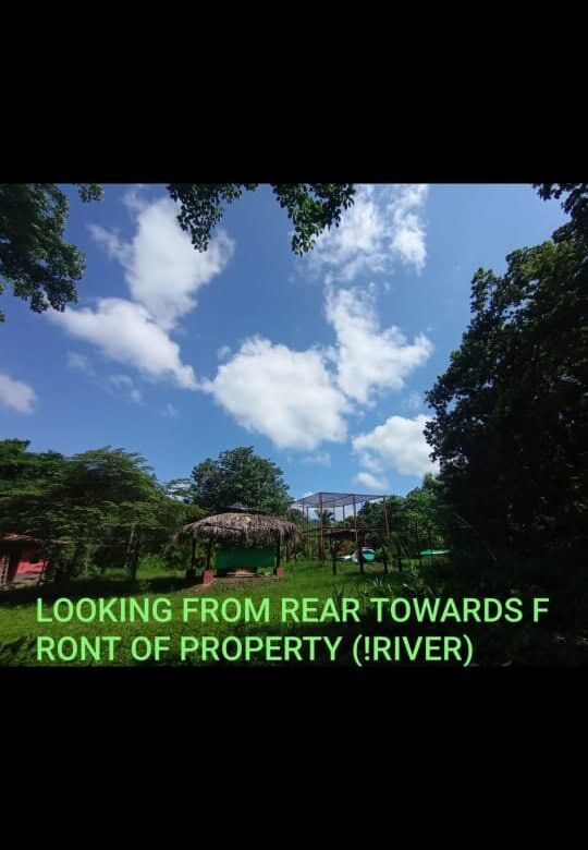 Scenic view of riverfront property near Playa Venao, Panama, ideal for eco-tourism projects.