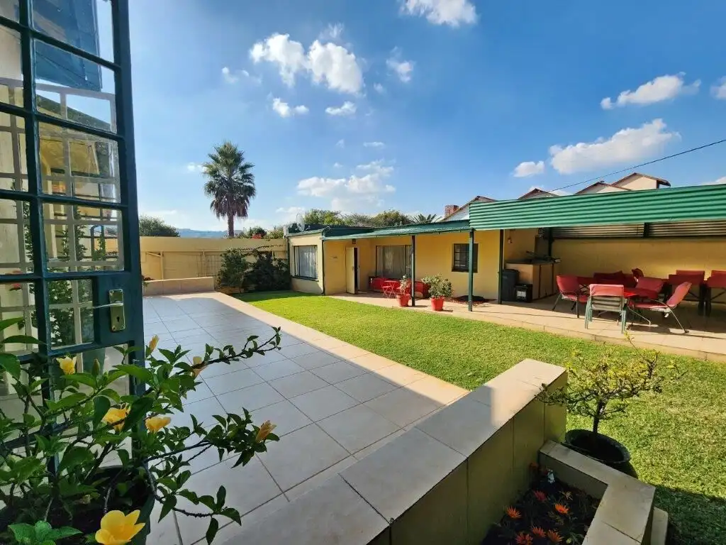 Beautiful 4-bedroom house with outdoor patio and garden in Albertville, Johannesburg South. Perfect.