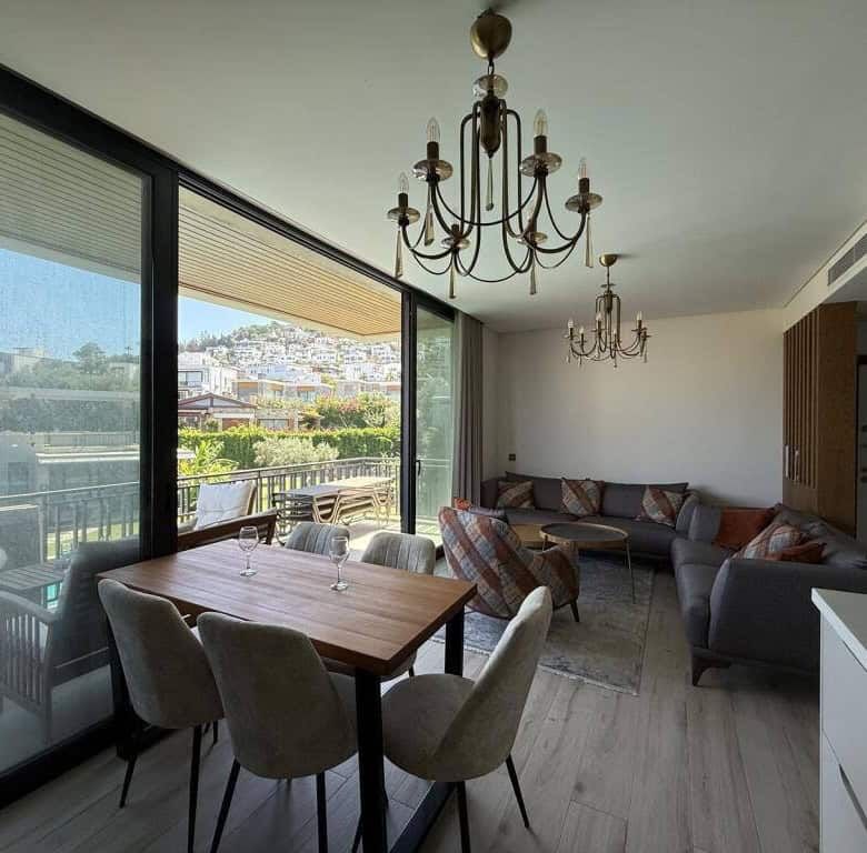 Modern living space with spacious dining and lounge area in Bodrum Yalıkavak.