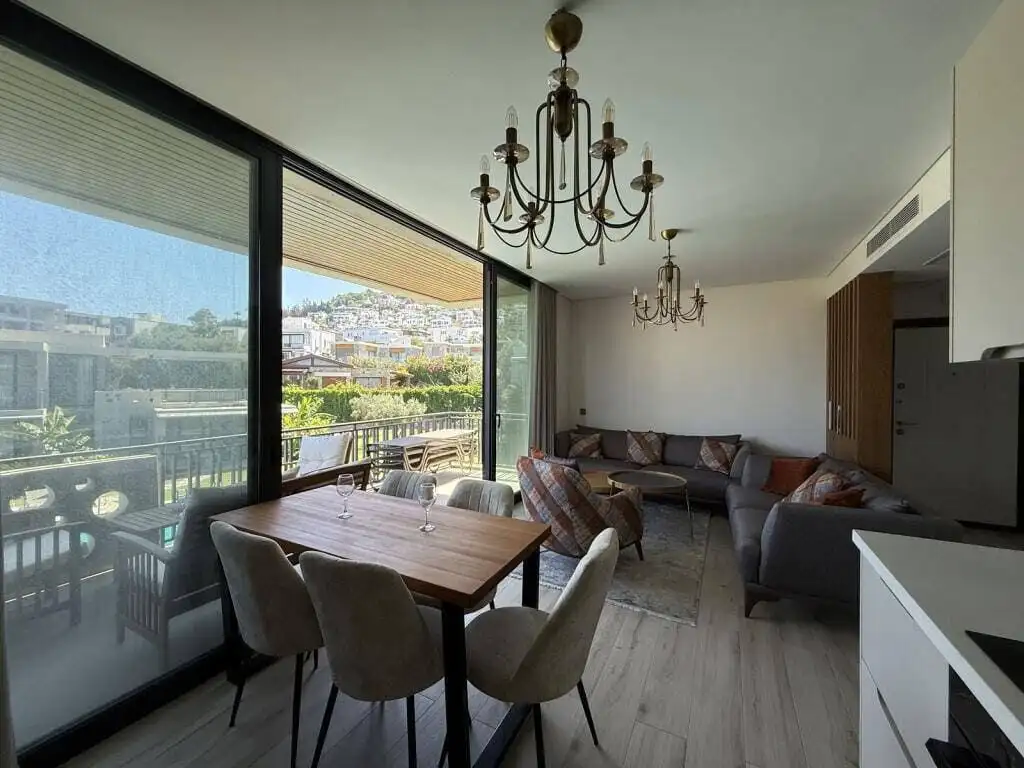 Modern living space with spacious dining and lounge area in Bodrum Yalıkavak.