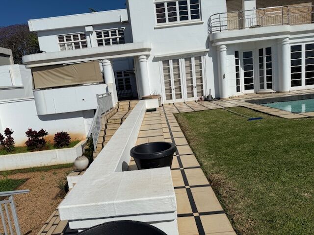 Luxury 5-bedroom villa for sale in Morning Side, Durban, featuring modern design and spacious outdoo.