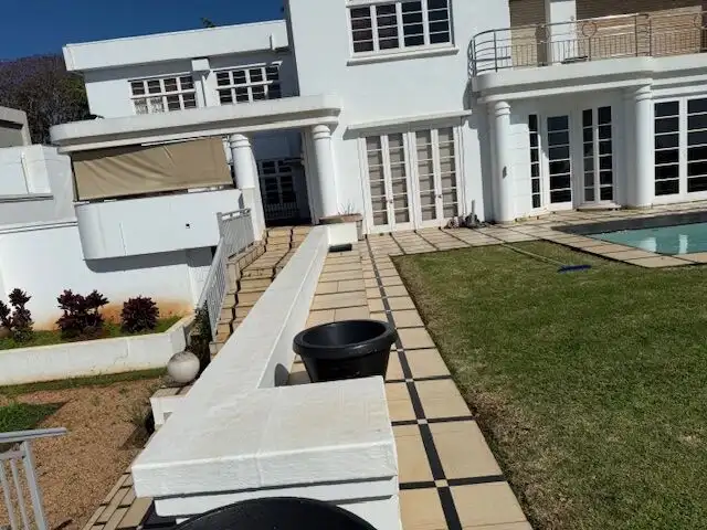 Luxury 5-bedroom villa for sale in Morning Side, Durban, featuring modern design and spacious outdoo.