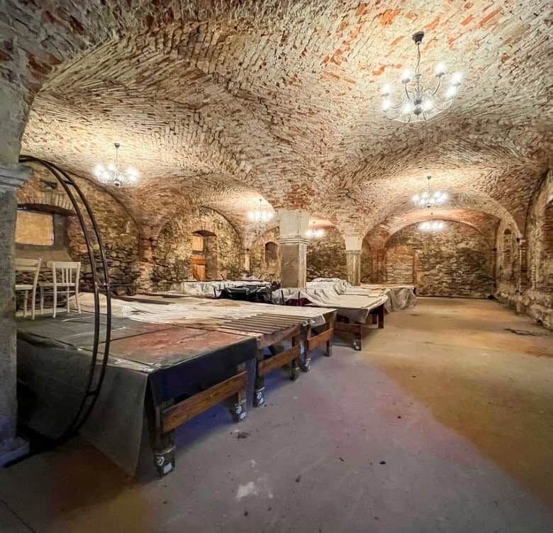 Ancient cellar with brick arches, perfect for renovation in Lubiechowa estate.