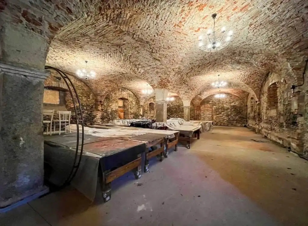 Ancient cellar with brick arches, perfect for renovation in Lubiechowa estate.