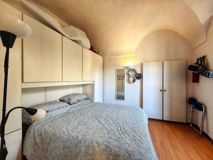 Interior view of a cozy 1-bedroom apartment in Bordighera Alta, Liguria.